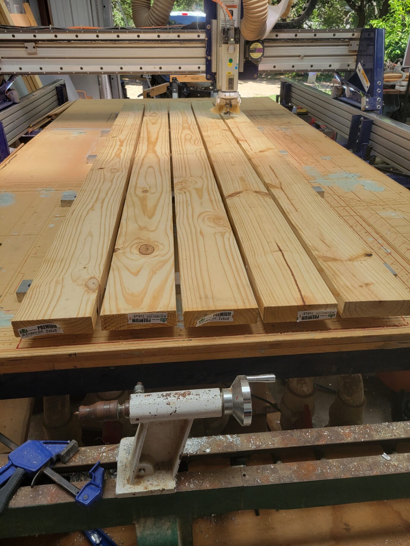 slats lined up on cnc table to be cut