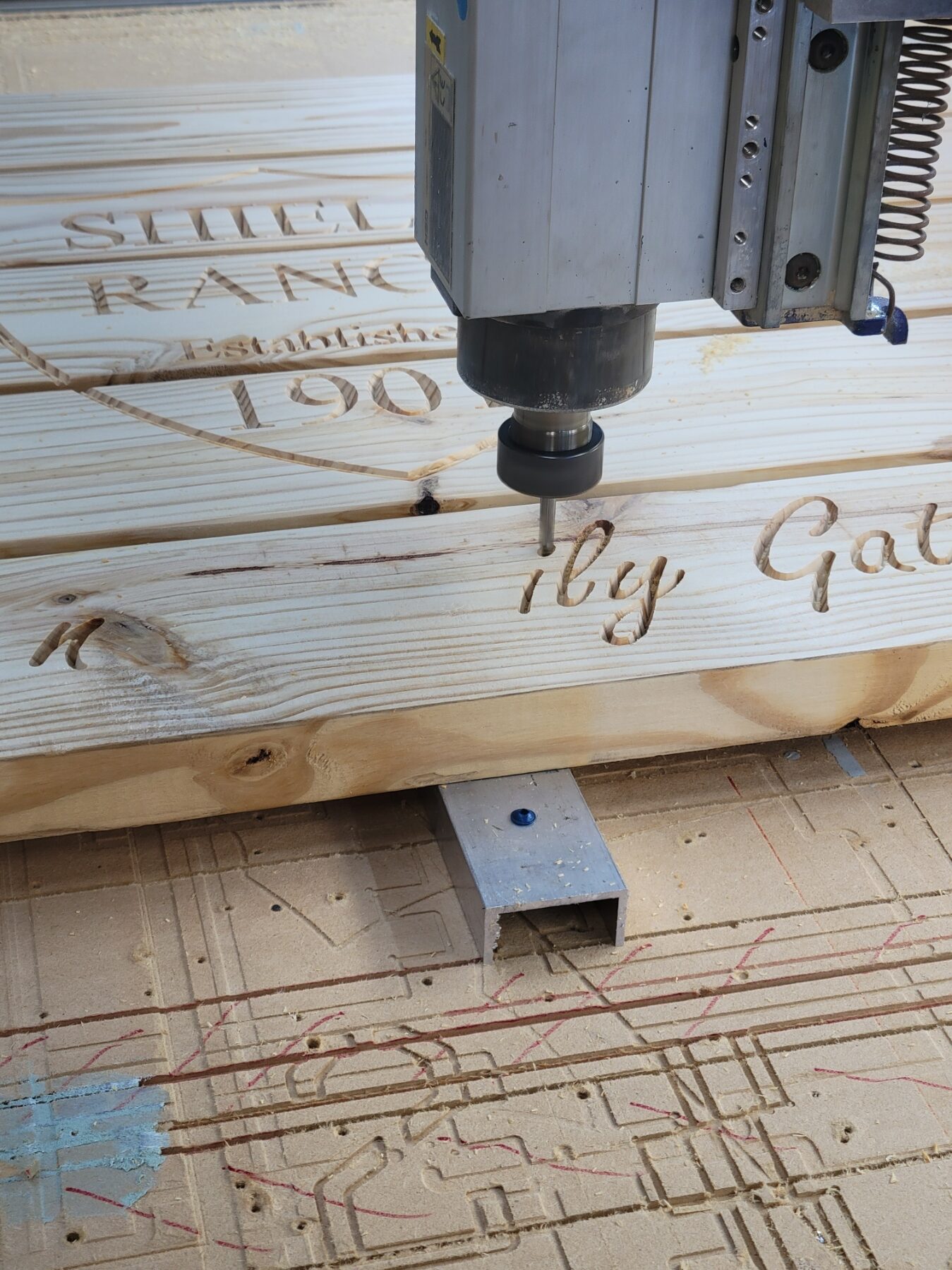 slats for a picnic table, mid carving by cnc machine.