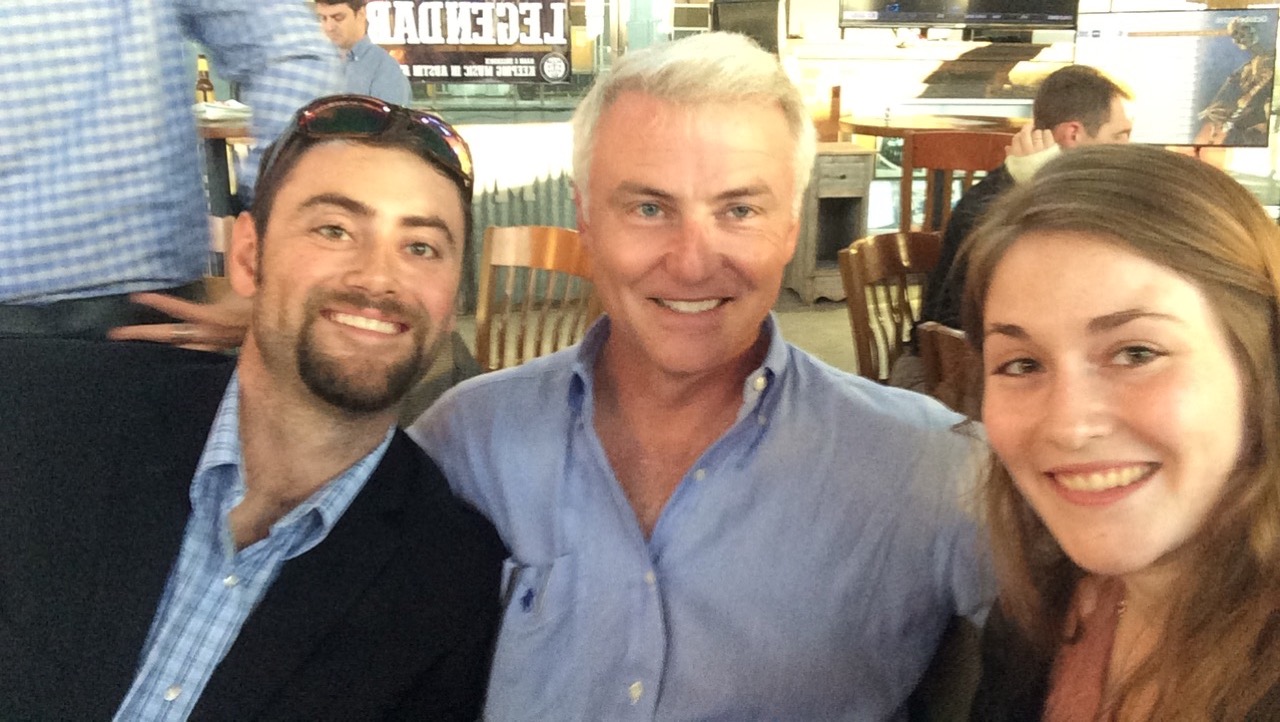 photo of 3 people in sitting down, smiling
